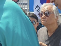 파리 올림픽 양궁 경기장을 찾은 백건우씨. 사진=이코노텔링 고현경 기자.